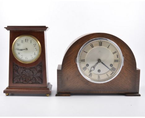 Edwardian mahogany mantel clock, carved decoration, enamelled dial, cylinder movement, 23cm; and two oak cased mantel clocks.