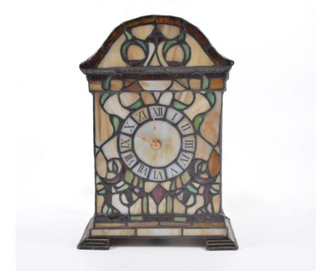 Stained glass effect mantel clock, leaded glass in the manner of Tiffany, battery driven movement, internally illuminated 26.
