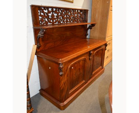 Victorian mahogany Chiffonier/sideboard, raised back with fretted panel above a shelf, carved corbels, base with a rectangula