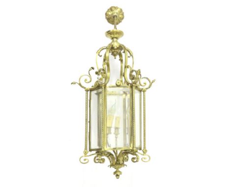 A Victorian Brass Hanging Lantern, mid 19th century, of hexagonal shaped form with bevelled glass panels, spiral turned suppo