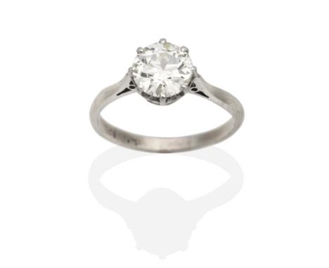 A Solitaire Diamond Ring, a round brilliant cut diamond in a claw setting, to knife edge shoulders, estimated diamond weight 