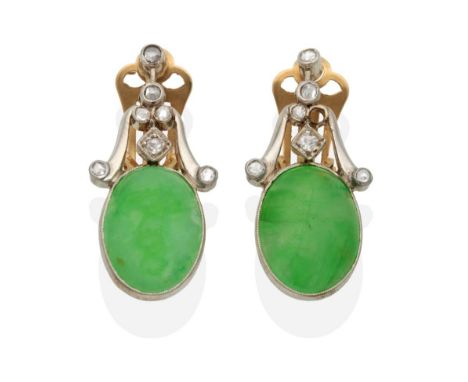 A Pair of Art Deco Jade and Diamond Earrings, a scroll frame inset with rose cut diamonds suspends an oval jade cabochon in a