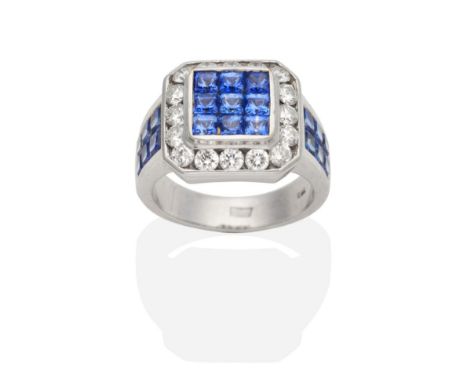 A Sapphire and Diamond Ring, a square cluster of square cut sapphires in rubbed over settings to an octagonal border of chann