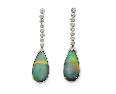 A Pair of Black Opal and Diamond Pendant Earrings, an articulated row of graduated round brilliant cut diamonds in rubbed ove