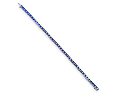 A Sapphire Line Bracelet, of channel set step cut sapphires, length 18.5cm see illustration  The bracelet is in good conditio