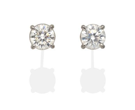 A Pair of 18 Carat Gold Solitaire Diamond Earrings, round brilliant cut diamonds in claw settings, total estimated diamond we