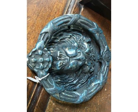 Lions head door knocker