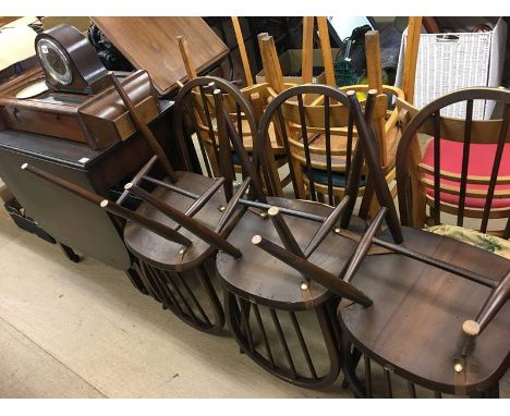 Oak table and six Ercol hoop back chairs