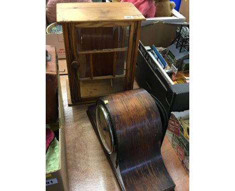 Mantle clock and a mini cabinet