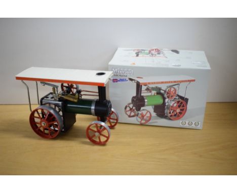 A Mamod Live Steam TE1A Steam Tractor with burner tray present, in original box
