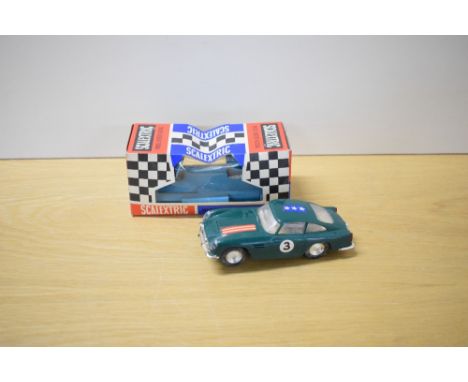A Tri-ang Scalextric Race Tuned Car, C68 Aston Martin DB4 GT in green with racing number 3 and stars and stripes decal, drive