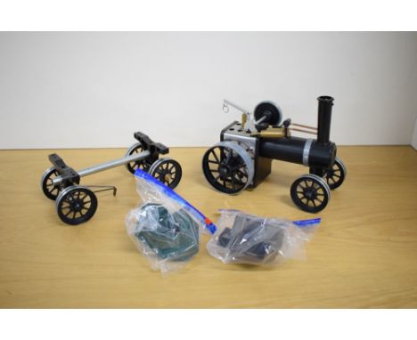 A Mamod Live Steam TWK1 Steam Tractor and Timber Wagon, both in black and silver, very little use
