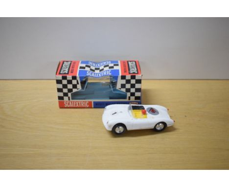 A Tri-ang Scalextric Race Tuned Car, C61 Porsche Competition in white with racing number 1 and Dunlop decal, driver wearing r