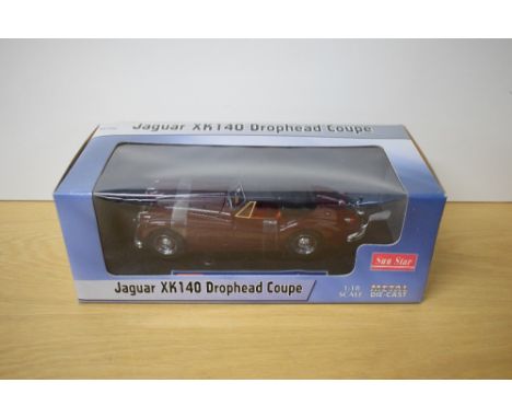 A Sun Star 1:18 scale die-cast, Jaguar XK140 Drophead Coupe, in window display box