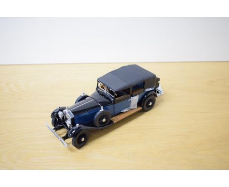 A 1988 Franklin Mint 1:24 scale Die-cast, 1929 Rolls Royce Phantom I Cabriolet De Ville with tag and Letter, in polystyrene p