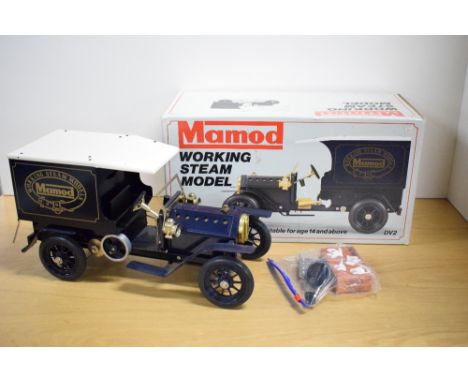 A Mamod DV2 Live Steam Delivery Van, dark blue, with accessory pack, boxed, appears unused
CONDITION REPORT
One back door loo