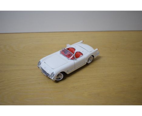 A 1989 Franklin Mint 1:24 scale Die-cast, 1953 Corvette with tag and Letter, in polystyrene packing and outer card delivery b