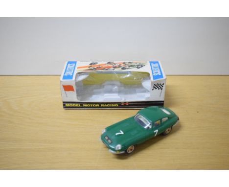 A Rovex Tri-ang Scalextric Car, C34 E Type Jaguar in green with racing number 7, driver wearing yellow helmet, in original wi
