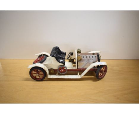 A Mamod Live Steam SA1 Roadster in white with black seat, burner tray present