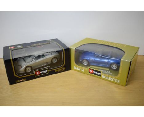 Two Burago 1:18 scale die-casts, 3045 1991 Bugatti EB 110 and 3349 1996 BMW M Roadster, both in window display boxes