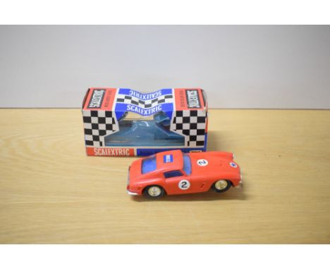 A Tri-ang Scalextric Race Tuned Car, C69 Ferrari GT Without Lights in red with racing number 2 and Titan with Star decal, dri