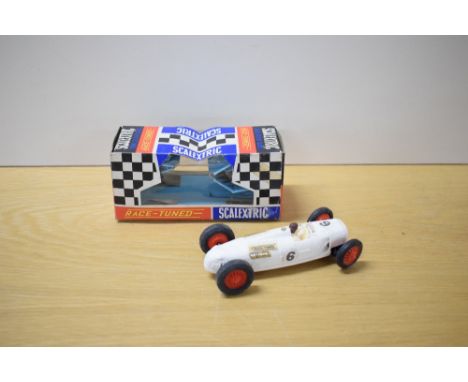 A Tri-ang Scalextric Race Tuned Car, C71 6 Litre Auto Union in white with racing number 6 and Titan with red hubs, driver wea