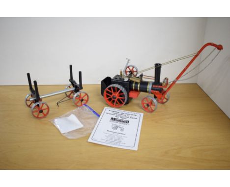 A Mamod Steam 4 Fun Live Steam Tractor and Timber Wagon, made up from a kit, crane attached, 6 piece engine tool kit present 
