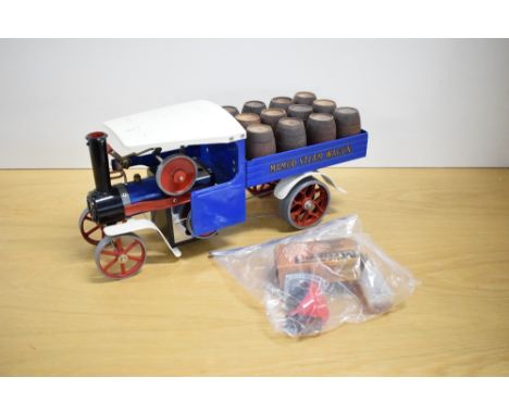 A Mamod SW1 Live Steam Wagon with 12 wooden barrels present, blue, and white, with accessory pack, clean condition