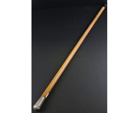 Antique silver handled malaca walking cane with engine turned decoration to handle 