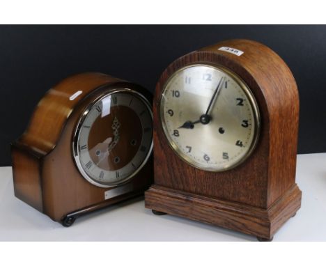 Two vintage wooden mantle clocks to include a chiming example. 