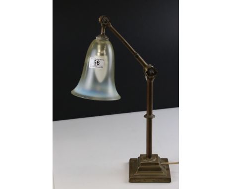 A antique brass adjustable desk lamp, marked Ducdill Patent to the base. 