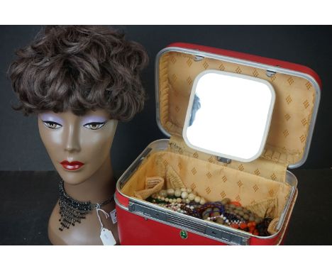 A Mannequin head for displaying jewellery, wigs or hats together with a red Echolac vanity case containing vintage costume je