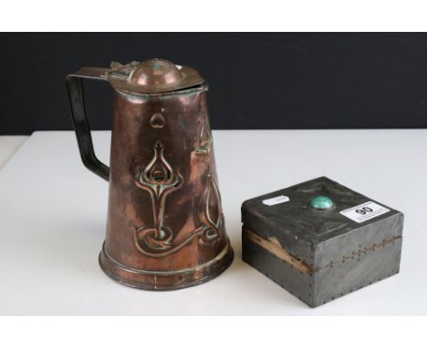 Joseph Sankey Art Nouveau Copper Lidded Jug with embossed stylised decoration, 20cms high together with an Arts and Crafts Pe