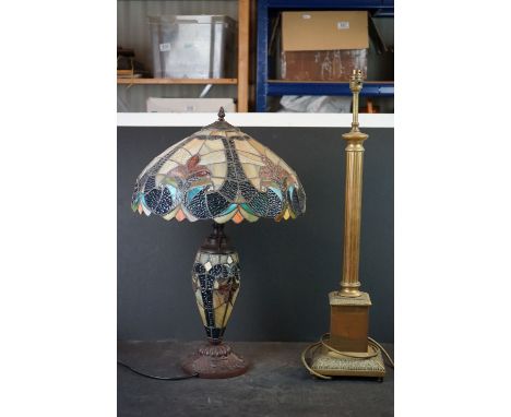 A vintage brass column table lamp together with a Tiffany style example. 