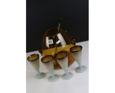 Cirencester Glassworks, Hand Blown Amber Glass Punch Bowl and Ladle, 23cms high together with Four White and Amber Glass Gobl