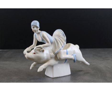Ceramic Art Deco style figure of a lady riding a pig 