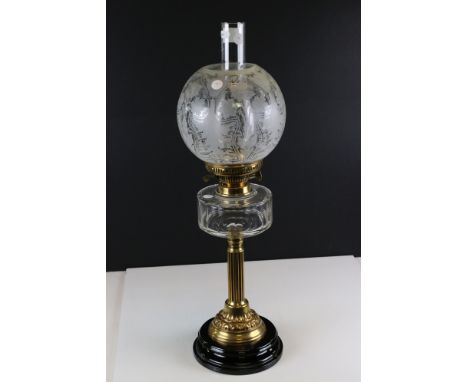 Late 19th / Early 20th century Oil Lamp with clear slice cut glass font, brass Corinthian column base and globular clear glas