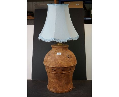 A large Terracotta contemporary lamp with Roman numerals decoration. 