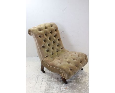 Victorian Button Upholstered Slipper Chair raised on bulbous front legs with castors, 73cms high 
