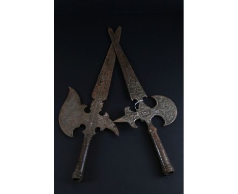 Two reproduction pole axe heads. 