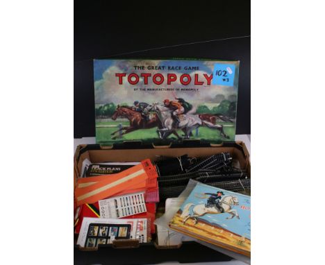 A collection of Hornby and other railway items together with a vintage Totopoly horse racing game, 1970's lone star spud gun 