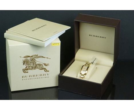Ladies Burberry BU 1093 dress watch in original box with instruction manual and warranty card 