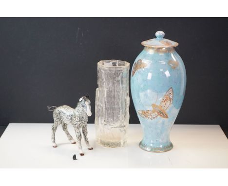 A Carlton Ware butterfly pattern ceramic lidded vase together with a bark patten glass vase and a ceramic pony. 