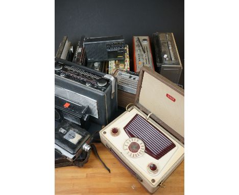 A large collection of vintage radios contained within two boxes to include Roberts examples. 