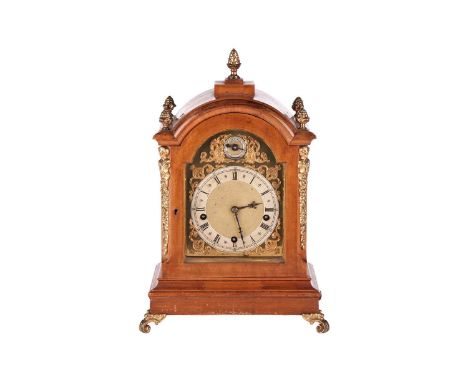 An early 20th-century W&amp;H (Winterhalter &amp; Hoffmeister) 8-day triple train mantel clock with a broken arch walnut case