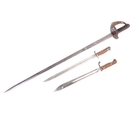 A Victorian 1897 pattern officer's dress sword and field scabbard by Wilkinson Sword No 37369, with etched blade, diced grip 