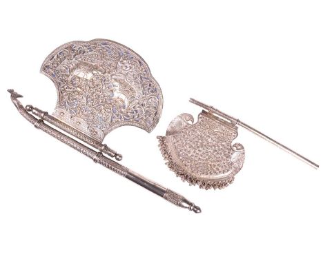 A late 19th century Indo Persian silver ceremonial Tabar (axe) the blade pierced and chased with war elephants in scroll file