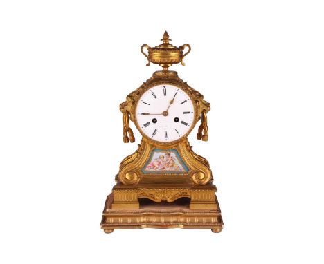 A Napoleon III ormolu drum-head form 8-day mantel clock by Japy Bros, retailed by Howell James &amp; Co of London, chiming th