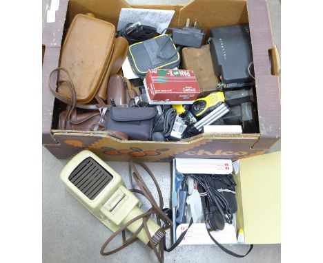 A box of cameras, a slide projector, camera accessories, etc. **PLEASE NOTE THIS LOT IS NOT ELIGIBLE FOR POSTING AND PACKING*