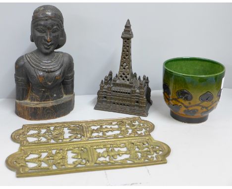 A cast model Blackpool Tower money box, a carved bust, possibly Indian, a pair of pierced brass door plates and a green potte